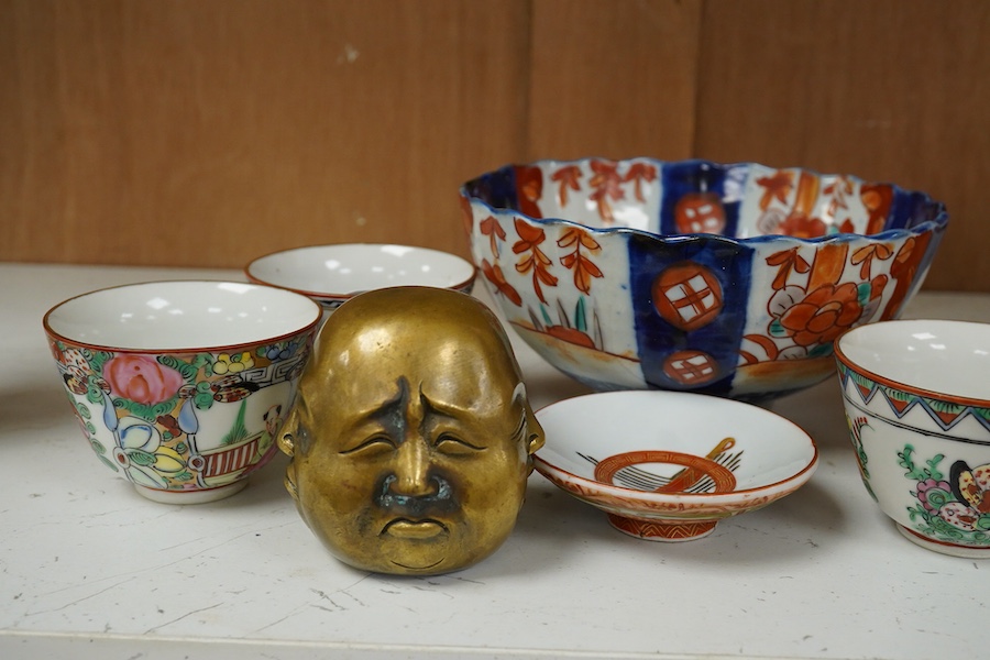 A Chinese Yixing teapot, a blue and white prunus jar, a Kutani tea bowl and two covers, other items, largest 15cm high